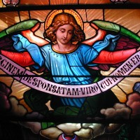 Angel panel from triple lancet restoration at Chestnut Hill College