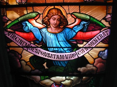 Angel panel from triple lancet restoration at Chestnut Hill College